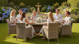 Group of people dining outdoors in a garden setting