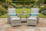Rattan outdoor furniture set with cushions and a small table on a white background, featuring a red sale label.
