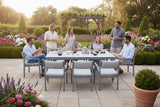 Outdoor furniture set with a table and eight chairs on a white background