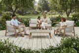 Outdoor furniture set with two chairs, a sofa, and a table on a white background