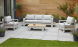 Outdoor furniture set with a sofa, two armchairs, and a coffee table on a white background