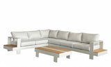 White sectional sofa with wooden coffee table on a white background
