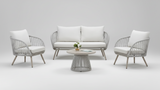 White outdoor furniture set with a table and chairs on a white background