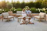 Outdoor furniture set with beige cushions on a white background