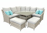 Outdoor patio furniture set with cushions in a showroom setting