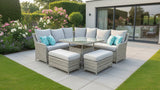 Outdoor patio furniture set with cushions in a showroom setting